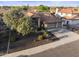 Beautiful aerial view of a charming single-Gathering home featuring desert landscaping and a three-car garage at 76 W Stacey Ln, Tempe, AZ 85284