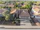 Stunning aerial view of this charming single-story home with a well-maintained landscape and a three-car garage at 76 W Stacey Ln, Tempe, AZ 85284