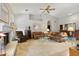 Spacious living room features a fireplace, carpet floors, vaulted ceiling and bar area at 76 W Stacey Ln, Tempe, AZ 85284