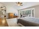 Large main bedroom featuring a ceiling fan, bay window, and a sitting area with lots of natural light and ample space at 76 W Stacey Ln, Tempe, AZ 85284