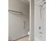 Bright shower featuring white subway tile surround and chrome fixtures at 76 W Stacey Ln, Tempe, AZ 85284