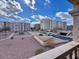 Complex exterior features desert landscaping and nearby parking at 7920 E Camelback Rd # 203, Scottsdale, AZ 85251