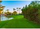 Golf course tee box with palm trees on the horizon at 7920 E Camelback Rd # 203, Scottsdale, AZ 85251
