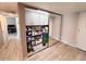 Practical storage room with shelving and mirrored doors, offering ample space at 7920 E Camelback Rd # 203, Scottsdale, AZ 85251
