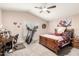 Bedroom featuring neutral walls, vaulted ceilings, a treadmill, and a ceiling fan at 8637 W Kathleen Rd, Peoria, AZ 85382