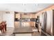 Well-lit kitchen with stainless steel appliances, a central island and plenty of counter space at 8637 W Kathleen Rd, Peoria, AZ 85382