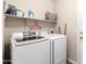 Laundry room with front-load washer and dryer at 8637 W Kathleen Rd, Peoria, AZ 85382