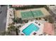 Aerial view of tennis courts and pool area within the community for active and relaxing living at 8804 E Sunnyside Dr, Scottsdale, AZ 85260