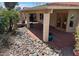 Backyard with rock garden, quaint bridge, and covered patio; ideal for entertaining at 8804 E Sunnyside Dr, Scottsdale, AZ 85260