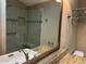 Bathroom with a walk-in shower, granite counters, and modern fixtures at 8804 E Sunnyside Dr, Scottsdale, AZ 85260