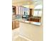 Features granite countertops, stainless steel appliances, and ample cabinet storage at 8804 E Sunnyside Dr, Scottsdale, AZ 85260