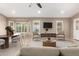 Inviting living room with neutral tones, comfortable seating, and ample natural light at 8804 E Sunnyside Dr, Scottsdale, AZ 85260