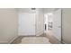 Neutral bedroom with sliding closet doors and easy access to the home's upper level at 9818 W Pontiac Dr, Peoria, AZ 85382