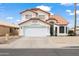Two-story home featuring a red tile roof, a two car garage, and neutral color palette at 9818 W Pontiac Dr, Peoria, AZ 85382