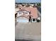 Charming home featuring well-maintained landscaping, a two-car garage and a welcoming front entrance at 9818 W Pontiac Dr, Peoria, AZ 85382