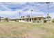 Manicured lawn with a backdrop of well-kept homes at 10815 W Hatcher Rd, Sun City, AZ 85351