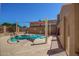 Outdoor hot tub with shaded covering, providing a relaxing amenity within the community at 10815 W Hatcher Rd, Sun City, AZ 85351