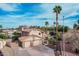 Beautiful home with desert landscaping, two-car garage, and lush greenery at 11101 W Sieno Pl, Avondale, AZ 85392