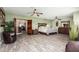 Spacious main bedroom with an ensuite bathroom and views of the upstairs hallway at 11101 W Sieno Pl, Avondale, AZ 85392