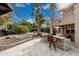 An outdoor kitchen and lounging space near the house at 11101 W Sieno Pl, Avondale, AZ 85392