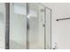 A close up of a clean and modern glass enclosed shower with chrome hardware at 11251 E Pratt Ave, Mesa, AZ 85212