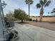 Backyard featuring mature landscaping and concrete patio at 1143 S 96Th St, Mesa, AZ 85208