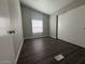 Bedroom features luxury vinyl plank flooring, good light, and closet with sliding doors at 1143 S 96Th St, Mesa, AZ 85208