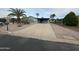 Inviting single-story home featuring desert landscaping and a covered carport at 1143 S 96Th St, Mesa, AZ 85208
