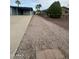Spacious side yard featuring gravel and block wall at 1143 S 96Th St, Mesa, AZ 85208
