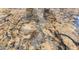 Close up on the multi-toned stone countertop at 15342 W Tasha Dr, Surprise, AZ 85374