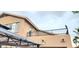 Exterior shot of the upper patio, light brown stucco and black railing at 15342 W Tasha Dr, Surprise, AZ 85374