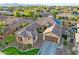 Beautiful aerial view showcasing the property, mature landscaping, and proximity to neighborhood amenities at 15430 W Sells Dr, Goodyear, AZ 85395
