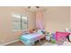 Bedroom with plush carpet and large window at 15430 W Sells Dr, Goodyear, AZ 85395