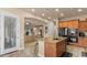Beautiful kitchen featuring an island, stainless steel appliances, and tile flooring at 15430 W Sells Dr, Goodyear, AZ 85395
