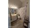 Bathroom with a shower, vanity, and decorative accents, offering a blend of style and functionality at 170 E Guadalupe Rd # 154, Gilbert, AZ 85234