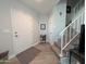 Bright entryway with laminate flooring and a staircase leading upstairs at 170 E Guadalupe Rd # 154, Gilbert, AZ 85234