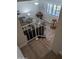 Cozy living room with grey sofas, laminate floors, and plantation shutters at 170 E Guadalupe Rd # 154, Gilbert, AZ 85234