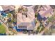 Stunning aerial view of property featuring a private pool, landscaped yard, and desert landscaping at 19644 N Majestic Vista Ct, Surprise, AZ 85387