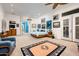 Expansive bedroom featuring art collection, ceiling fan and exterior access at 19644 N Majestic Vista Ct, Surprise, AZ 85387