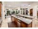 Spacious kitchen featuring granite countertops, stainless steel appliances, and wood cabinets at 19644 N Majestic Vista Ct, Surprise, AZ 85387