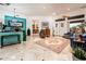 Spacious living room with tile floors, colorful walls, and high ceilings at 19644 N Majestic Vista Ct, Surprise, AZ 85387