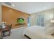 Primary bedroom featuring modern lighting, neutral paint and ample space at 20721 W Fern Dr, Buckeye, AZ 85396