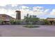 Community clubhouse entrance with desert landscaping, showcasing the community's amenities at 20721 W Fern Dr, Buckeye, AZ 85396