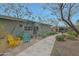 Attractive condo with colorful patio furniture and a lush landscaped courtyard in a lovely community at 20721 W Fern Dr, Buckeye, AZ 85396