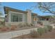Charming single-story home with a well-maintained landscape, brick accents, and inviting curb appeal at 20721 W Fern Dr, Buckeye, AZ 85396