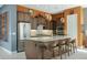 A closer view of the island in a gourmet kitchen, stainless appliances and pendant lights at 20721 W Fern Dr, Buckeye, AZ 85396