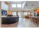 Bright and spacious open-concept living room and dining area with large windows at 22139 N O Sullivan Dr, Maricopa, AZ 85138