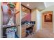 Convenient office area complete with built-in desk and display shelving by the stairs at 22139 N O Sullivan Dr, Maricopa, AZ 85138