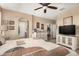 A nicely decorated main bedroom features an ensuite bathroom and a spacious walk-in closet at 23791 W Magnolia Dr, Buckeye, AZ 85326