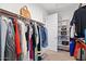 Walk-in closet with organized shelving and hanging space, maximizing storage and convenience at 24878 N 172Nd Dr, Surprise, AZ 85387